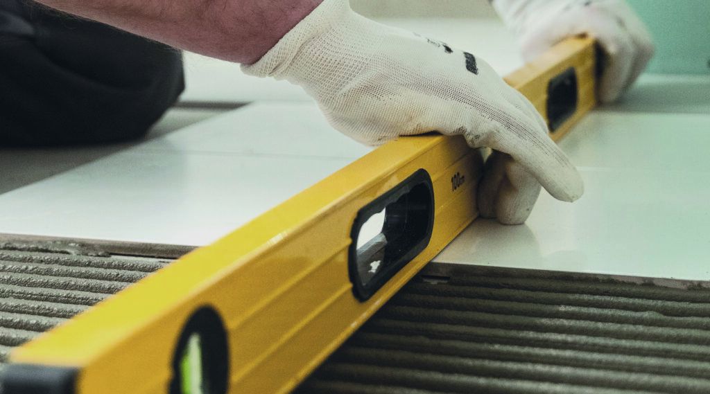 tiler-working-renovation-apartment